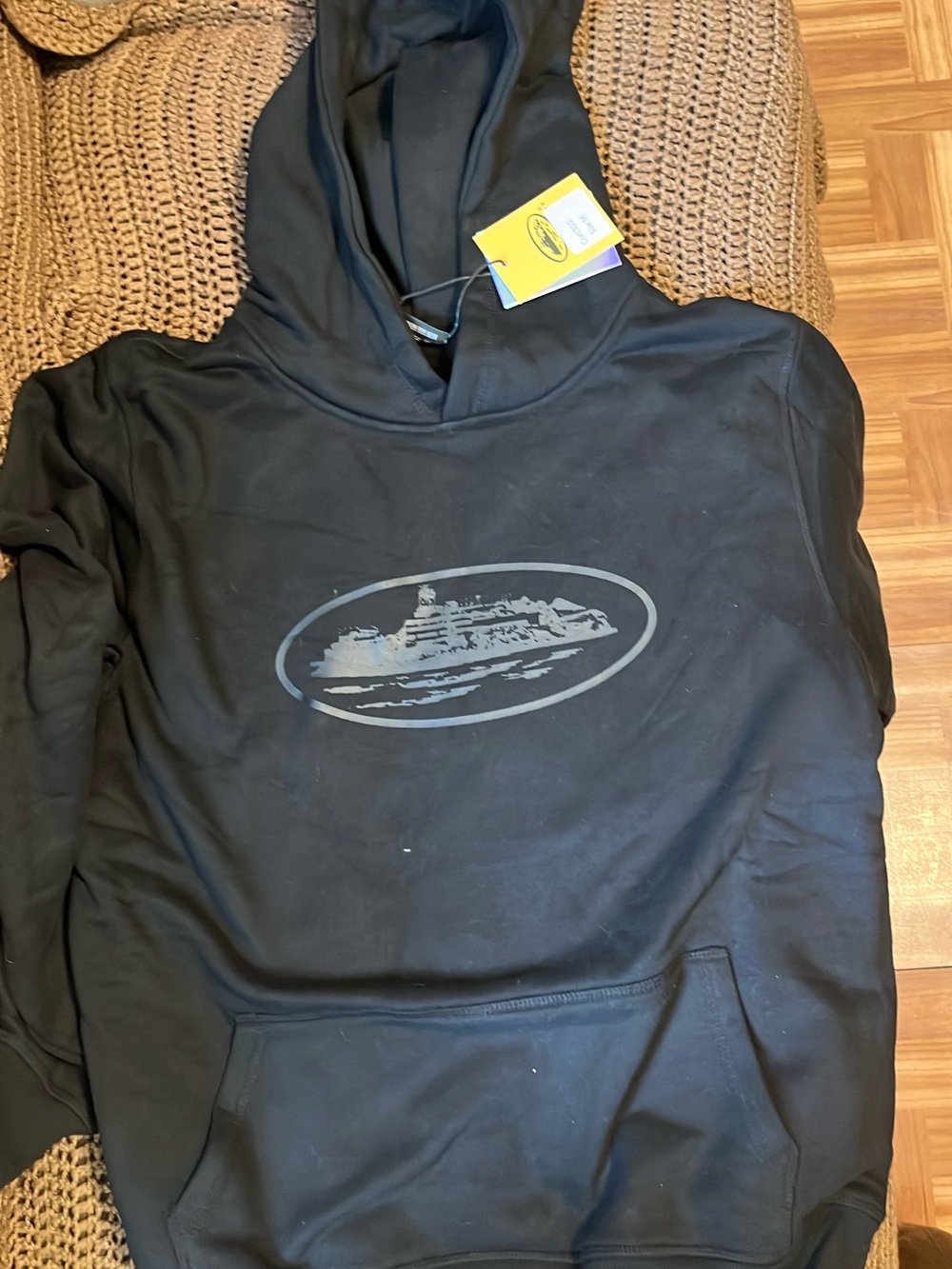 Men's Black Pullover Hoodie with Subtle Oval Graphic